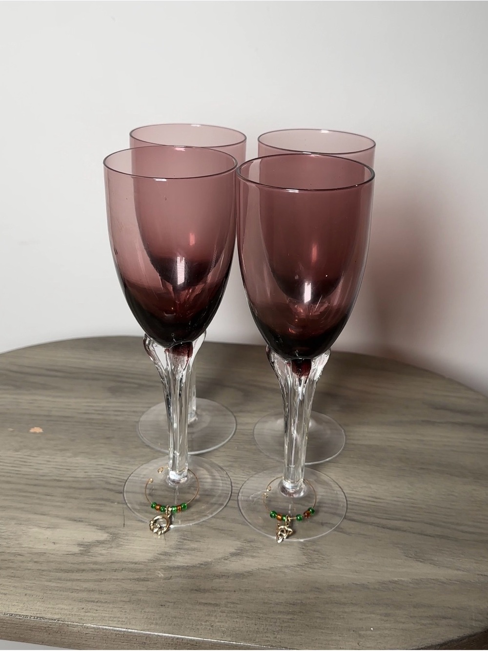 Set Of Four Amethyst Twisted Stem Wine Glasses With Two Stem Charms